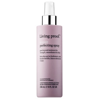 Living Proof Restore Spray on white background
