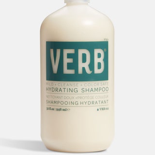 clear bottle of white verb hydrating shampoo with teal lettering on the label
